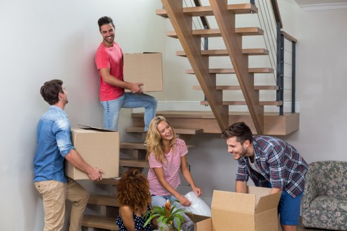 Customer moving storage items safely in a self storage facility